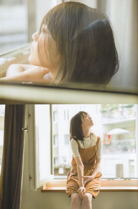 窓辺から外を眺める生田絵梨花